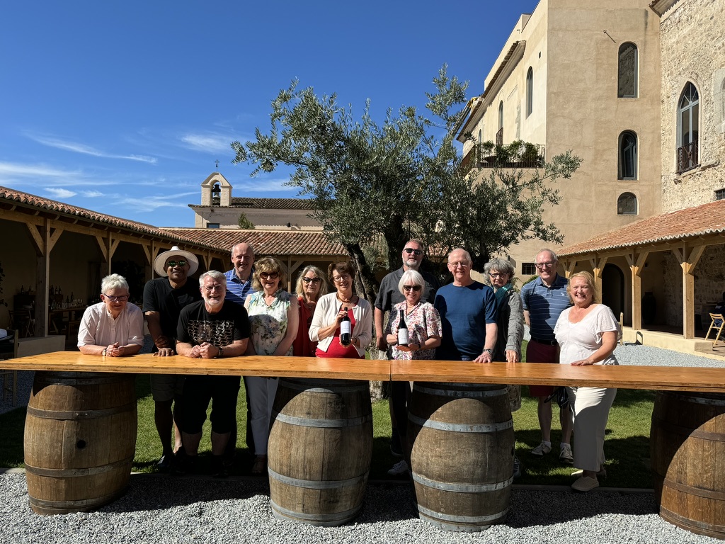 a group of people sitting atFitapreta learning how to blend wine in the Alentejo with Annie B