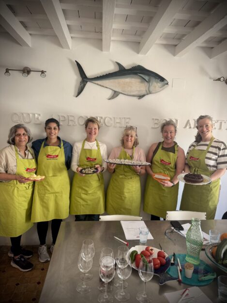Finishing a dishes, chocolate and almond cake, boquerones en vinagre, and many more, at a cooking class at Vejer de la Frontera in Cadiz with Annie B Spain